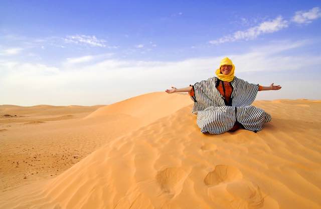 Woman in moroccan desert